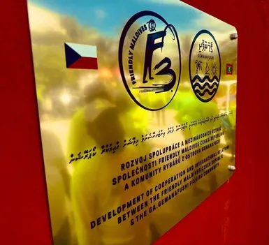 Plaque commemorating the international cooperation between Friendly Maldives and the fishing community of Gemanafushi Island, Maldives