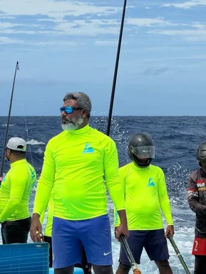 Group of Maldivian fishermen engaged in traditional tuna fishing on the open sea