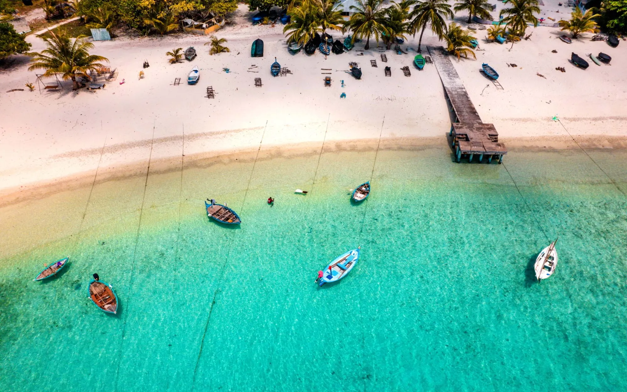 Tropical Maldivian beach with pier – home of Friendly Maldives premium tuna