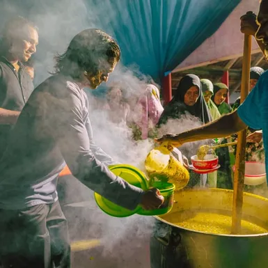Traditional Maldivian cuisine – food preparation during local celebration